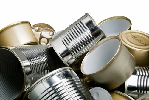 Team loading a transit van with waste at a commercial clearance site